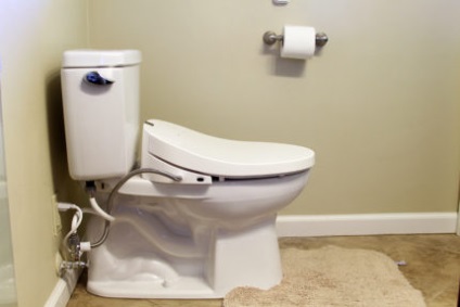 Bideu de acoperire pentru scaune de toaletă, asamblare mecanică și electronică (fotografie)