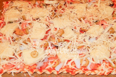 Pizza cu fructe de mare - o rețetă cu o fotografie