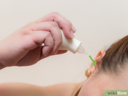 Как да премахнете щепсела на ухото с помощта на зехтин