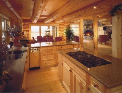Bucătărie într-o amenajare interioară a casei de lemn și designul acesteia