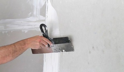 Punerea chitului pe perete cu un pistol de pulverizare este posibil și cum se aplică finisarea pe gips-carton sau