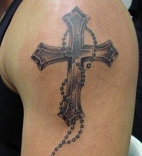 Tattoo cruce pe umăr de pe portal