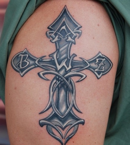 Tattoo cruce pe umăr de pe portal