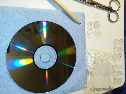 Decoratiuni de Craciun - fulgi de zapada de pe cd-discuri