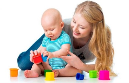 Jocuri cu un copil de 9 luni și jucării adecvate decât pentru a lua un copil