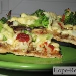 Pizza din dovlecei cu brânză și roșii 