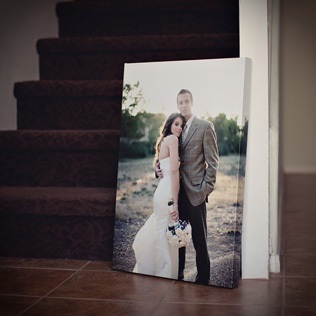 Recomandă tipărirea fotografiilor de nunți pe panza