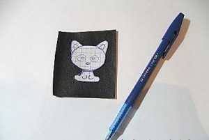 Hímzés egy macska gyöngyökkel egy mesterkurzusban (séma)