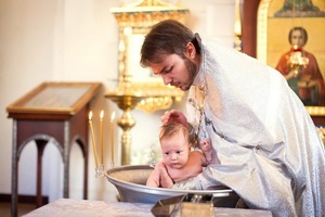 Botezul unui copil este important pentru părinți