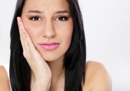 Cum de a calma durerea după o extracție dentară (dinte) Cum de a calma durerea după extracția dentară