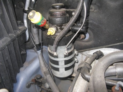 Încălzirea (combustibilul diesel de încălzire) Filtru combustibil 1 Încălzirea filtrului de carburant 1