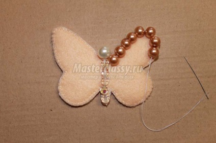 Butterfly Brosa din fetru, cu mâinile lor (brosa) Butterfly Brosa din pâslă, cu mâinile lor