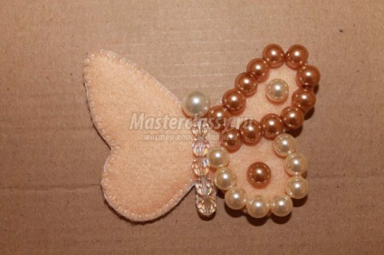 Butterfly Brosa din fetru, cu mâinile lor (brosa) Butterfly Brosa din pâslă, cu mâinile lor