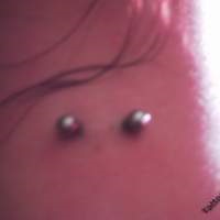 Piercing pe fotografie gât (fotografii) Piercing pe gât Photo