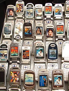 Telefonul mobil - este () Telefonul mobil - l
