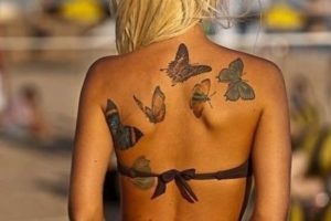 fluture tatuaj pe spate - ceea ce înseamnă fotografii, schițe