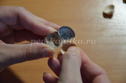 Topiara de cochilii cu mâinile lor (topiara) Topiara de cochilii cu propriile lor mâini