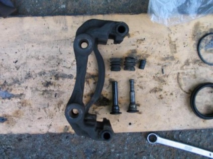 Repararea etrier față la sistemul de frânare · nissan nissan · faq nissan (Almera) Repararea etrier față la sistemul de frânare · nissan nissan · faq nissan