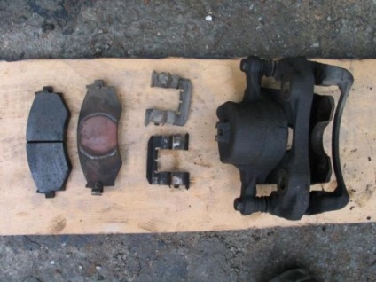 Repararea etrier față la sistemul de frânare · nissan nissan · faq nissan (instrucțiuni) Repararea etrier față la sistemul de frânare · nissan nissan · faq nissan