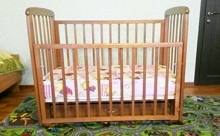 Cum de a alege un pat de copil pentru o imagine de ansamblu nou-născut de modele