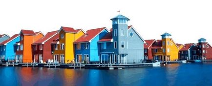 Cum să picteze fațada casei, ridica de culoare și frumusețe, cât costă