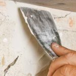 Etapele de recuperare a ipsosului au căzut departe de perete (ipsos) Etapele de recuperare a tencuiala a căzut departe de perete
