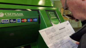 Cum de a plăti pentru utilități prin card de ATM-uri Banca de economii și numerar