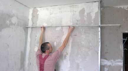 Alinierea pereților conform instrucțiunilor balize pentru lucrul cu propriile sale mâini