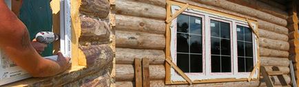 Montare de ferestre case de lemn cu mâinile lor