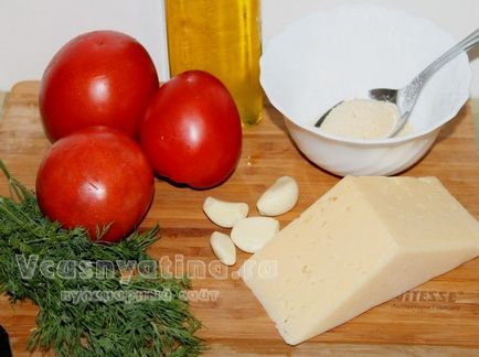 Tomate coapte cu brânză în rețetă cuptor cu o fotografie