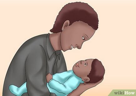 Cum se ține copilul în brațe