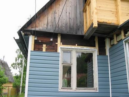 Mai bine tocesc casa de lemn din decorul exterior și exterioare