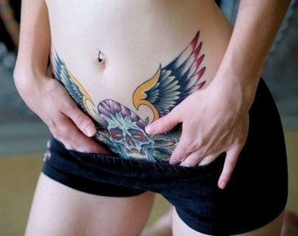 Tatuaj pe burtă pentru femei după naștere pentru a ascunde vergeturi
