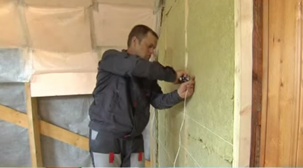 Cum de a stabili sistemul de încălzire pe peretele din lemn și cărămizi în interiorul