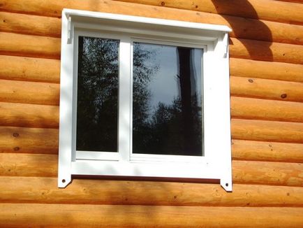 Instalare de ferestre din PVC intr-o casa de lemn