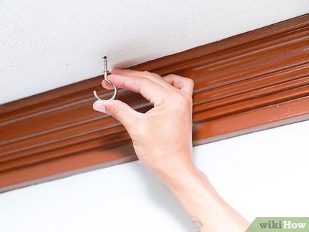 Cum se setează un cârlig în tavan