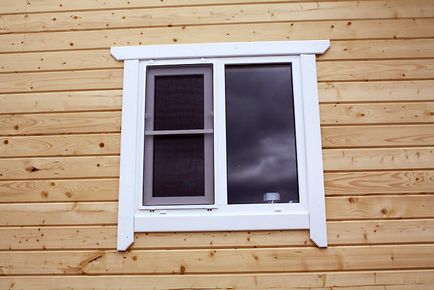 Trim pe fereastra intr-o casa din lemn instrucțiuni de instalare