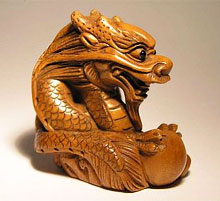 Netsuke - o amuletă a valorii mascota dragon